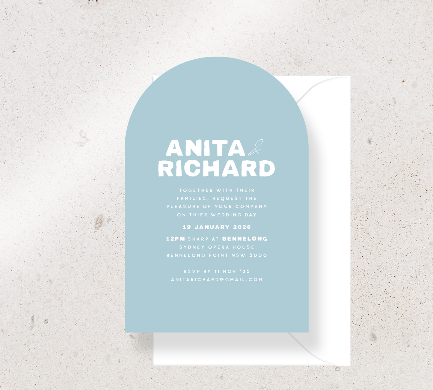 Customisable Arch invitation design from our Salut collection - White ink on Duck egg blue card, paired here with a white envelope