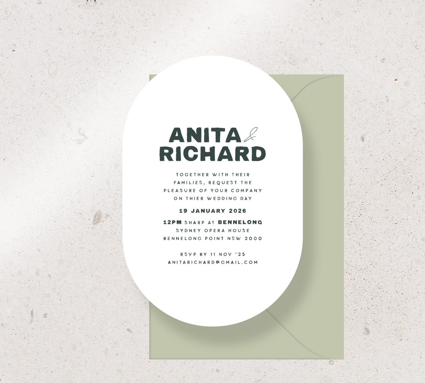 Customisable Oval invitation design from our Salut collection - Hunter Green ink on white card, paired here with a Matcha envelope