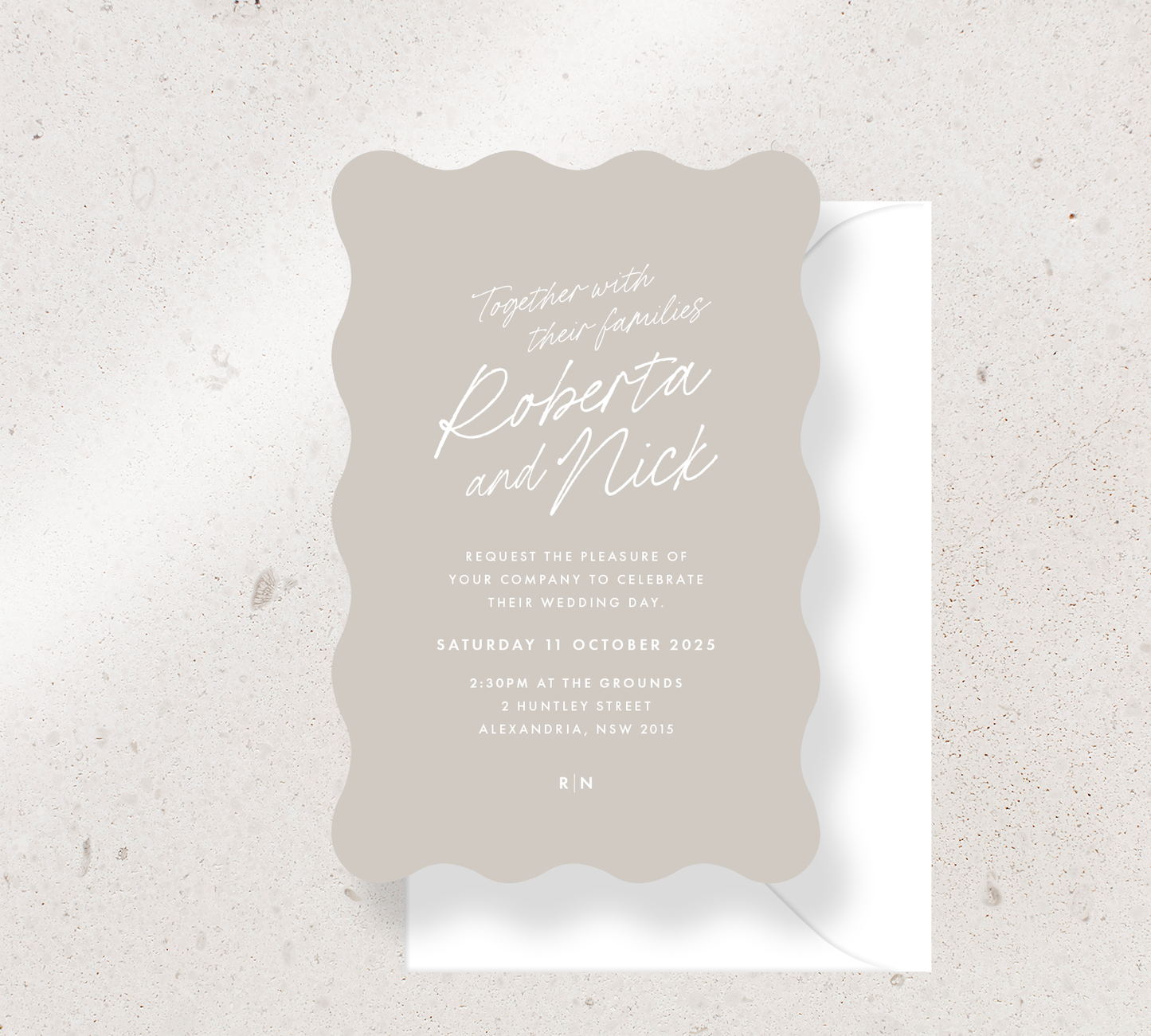 Wave shape invitation card from the Ardour collection - Stone stock and white ink, paired with a white envelope