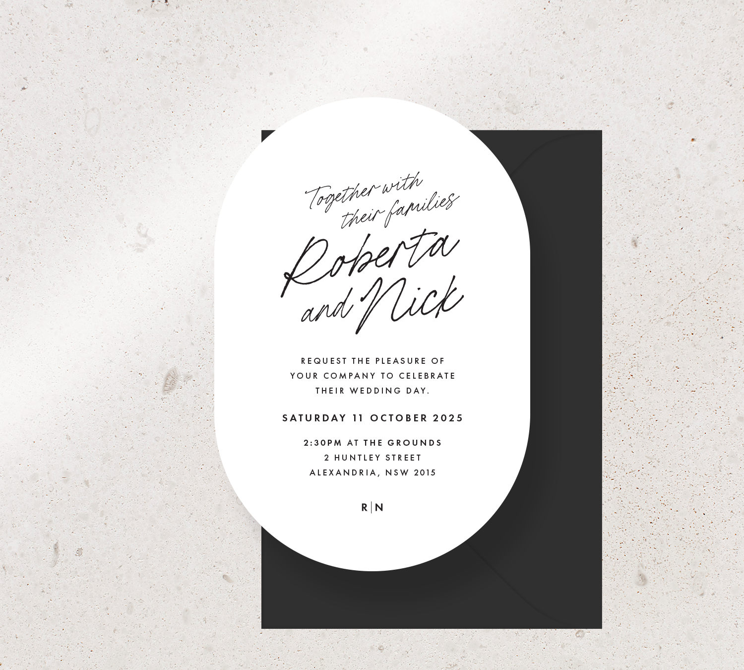 Oval shape invitation card from the Ardour collection - White stock and black ink, paired with a black envelope