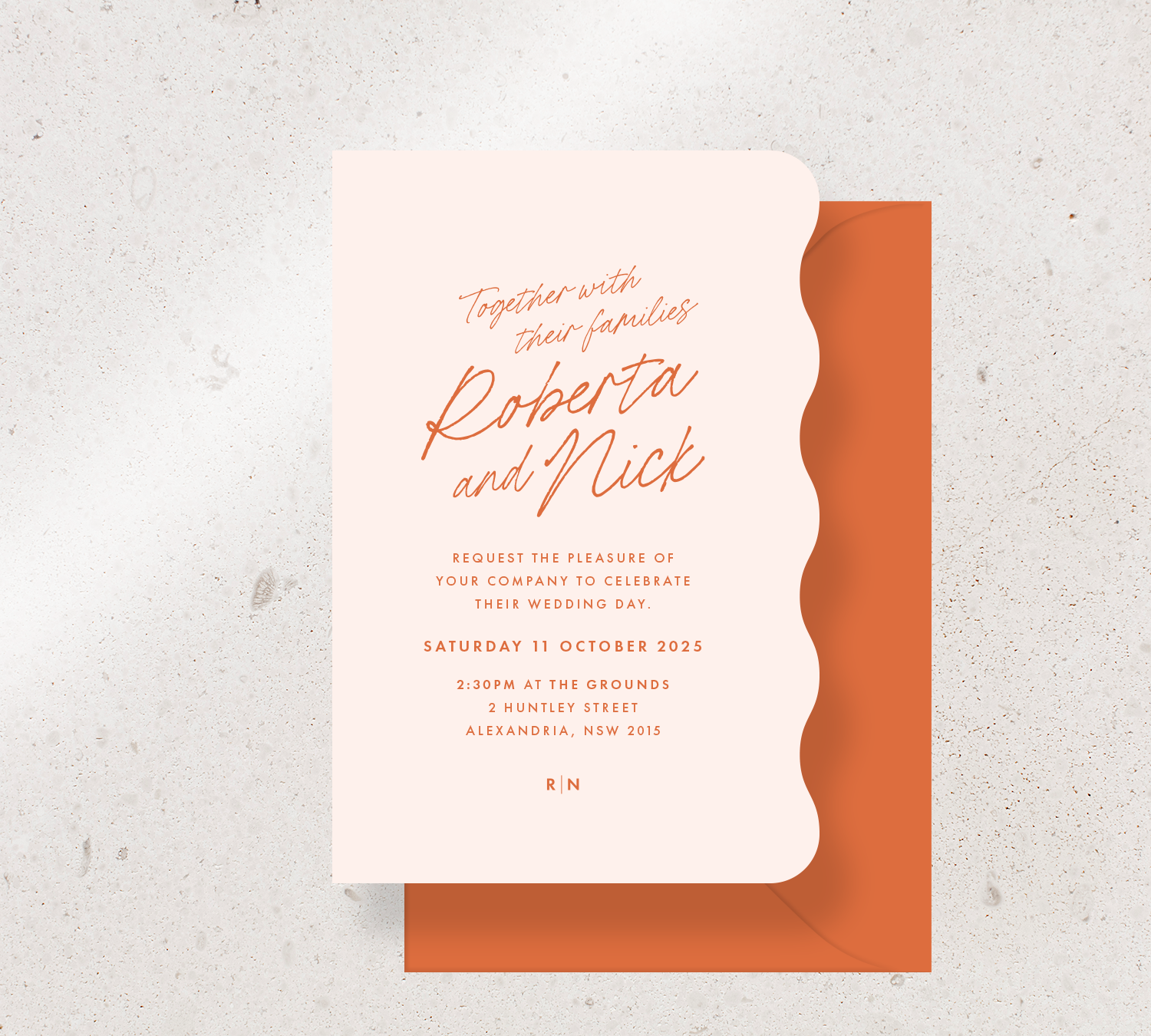 Wiggle shape invitation card from the Ardour collection - Nude stock and orange ink, paired with an orange envelope