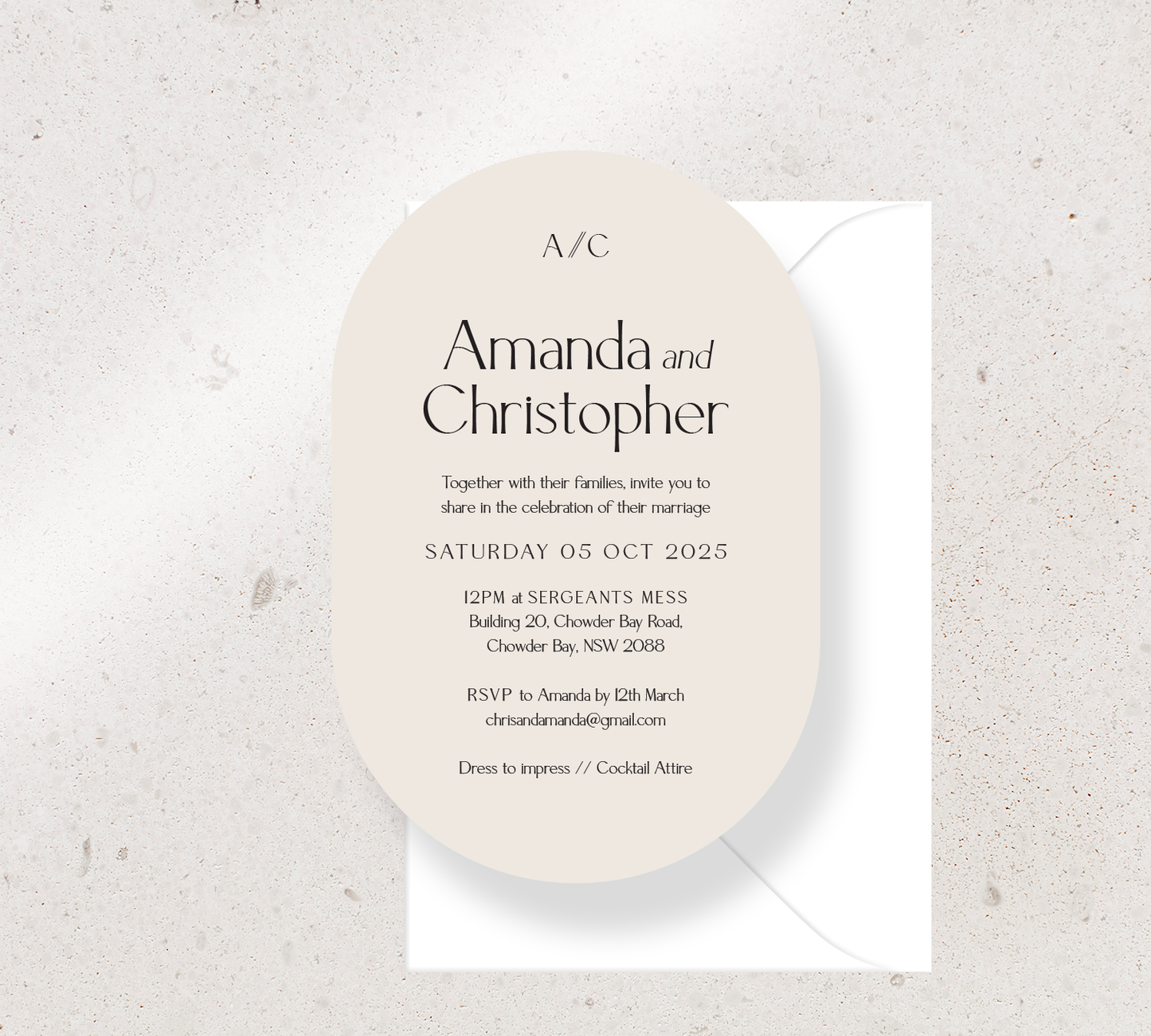Customisable Oval invitation design from our Estate collection - Black ink on Almond card, paired here with a white envelope
