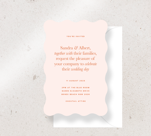 Customisable Wave invitation design from our Grande collection - Burnt orange ink on Nude card, paired here with a white envelope